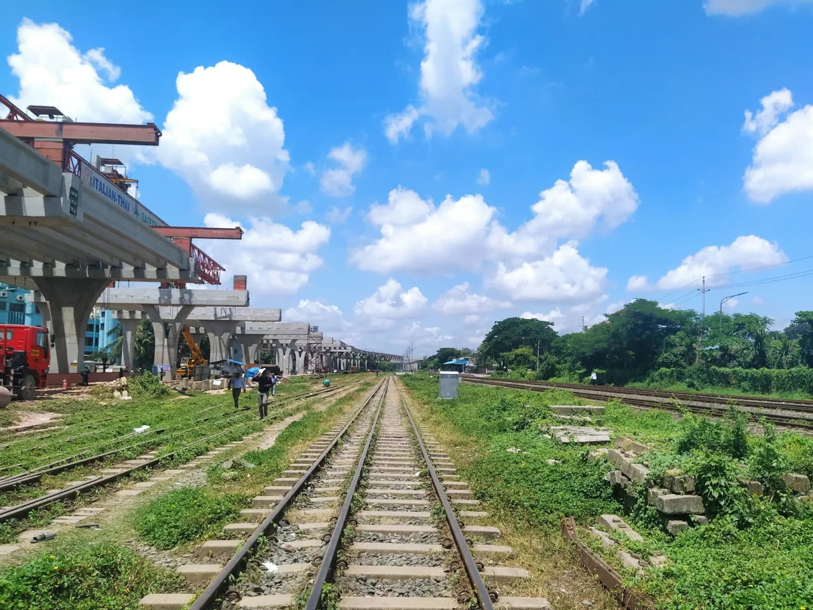 Railway line and train route through Dhaka, Bangladesh, regional travel context for Hatirjheel